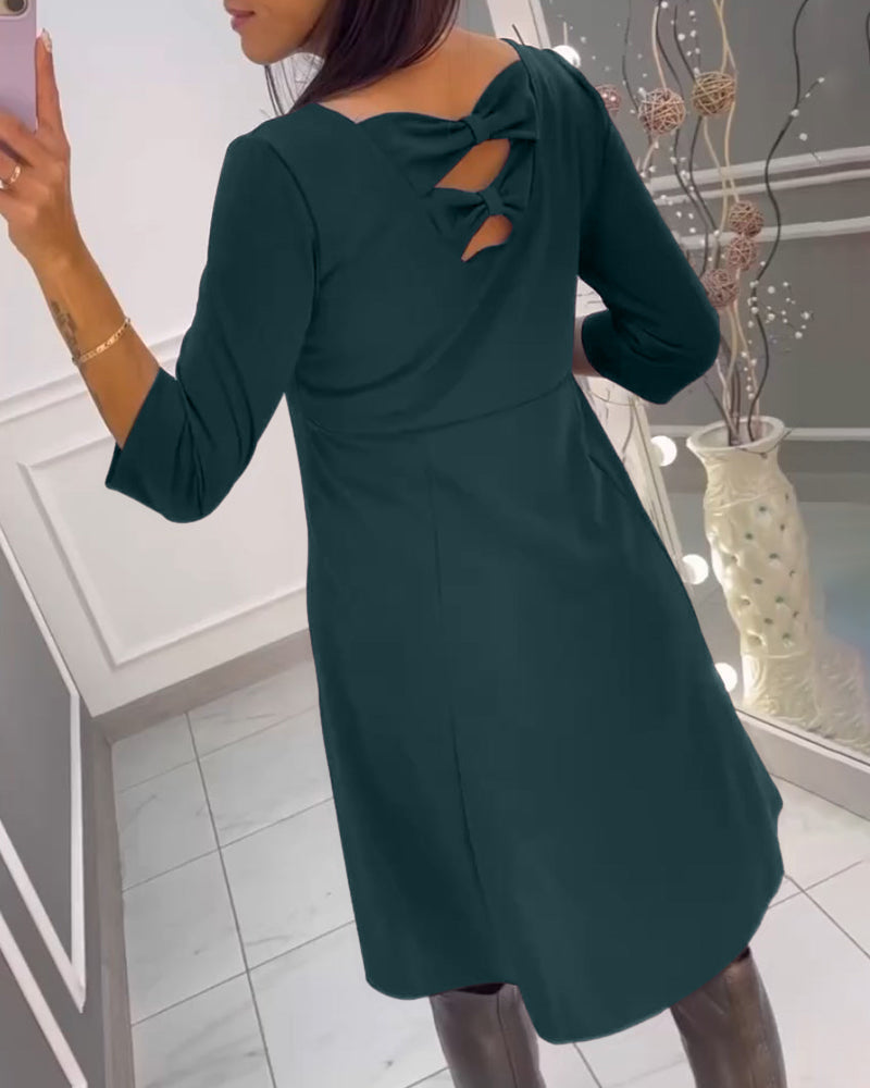 Robe unie avec nœud au dos