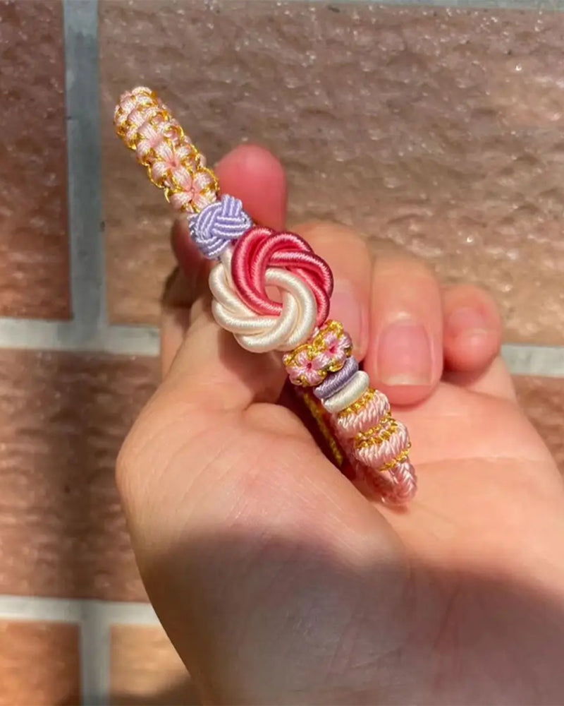 Bracelet avec noeud de fleurs de pêcher