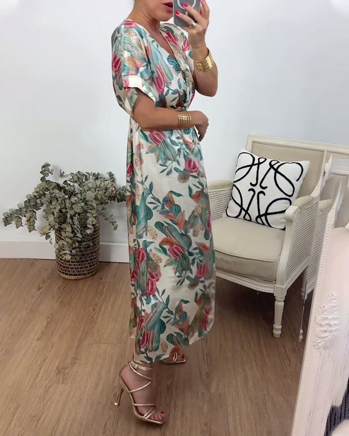 Robe élégante torsadée à col en V et imprimé botanique