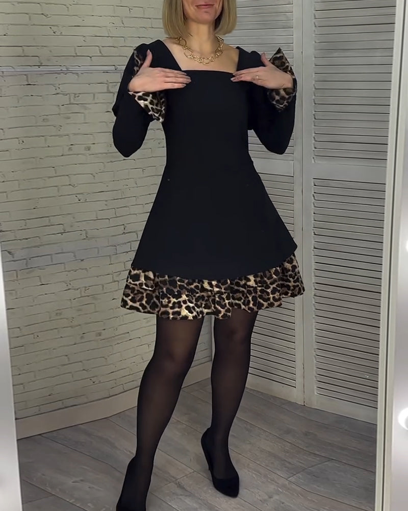 Robe élégante à manches bouffantes et imprimé léopard
