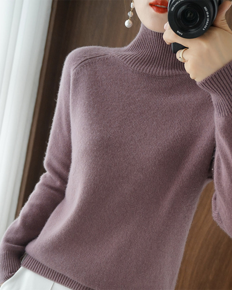 Pull simple à manches longues et col haut de couleur unie