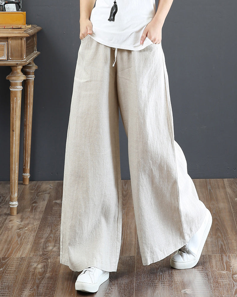Pantalon large taille haute de couleur unie
