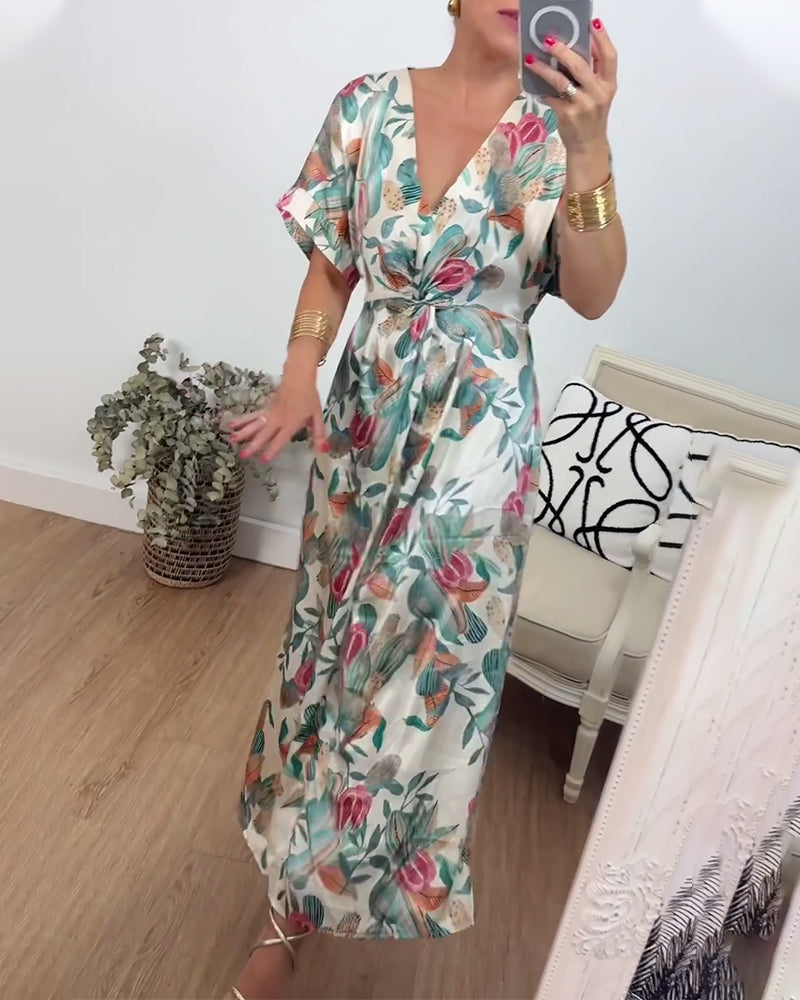 Robe élégante torsadée à col en V et imprimé botanique