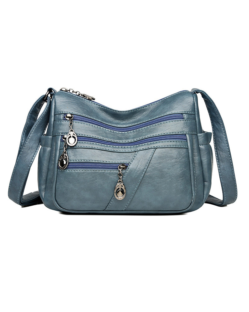 Sac bandoulière en cuir souple avec multipoches