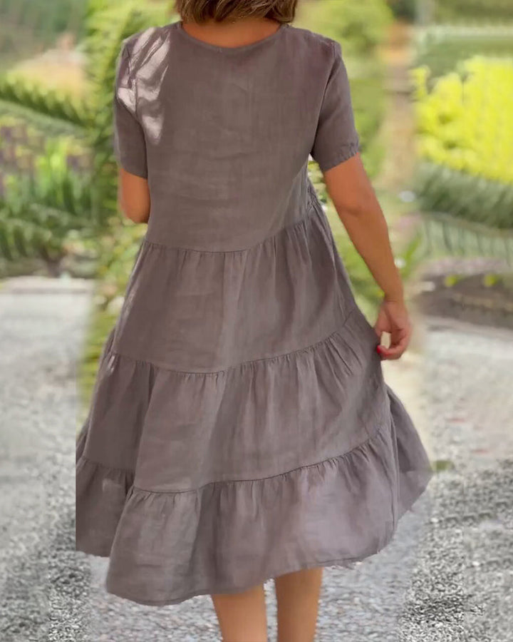 Robe en coton lin avec col en V de couleur unie