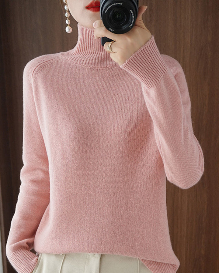 Pull simple à manches longues et col haut de couleur unie