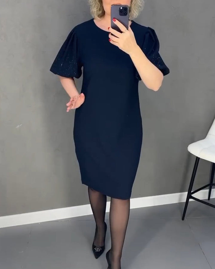 Robe élégante à manches courtes bouffantes