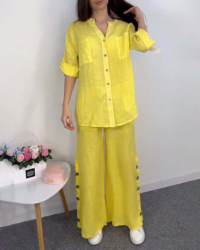 Ensemble chemisier et pantalon large en dentelle avec poche boutonnée et couleur unie