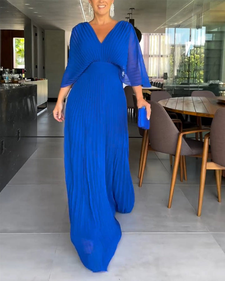 Robe à plis et taille cintrée